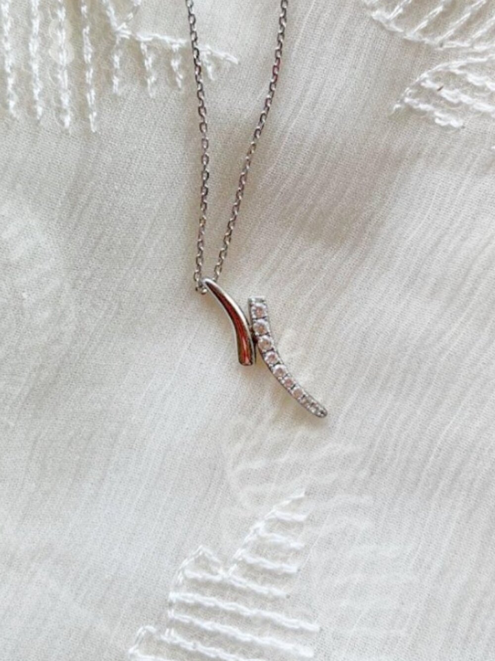 Touchstone Crystal x Swarovski crystal pave necklace dainty modern bar curve y2k